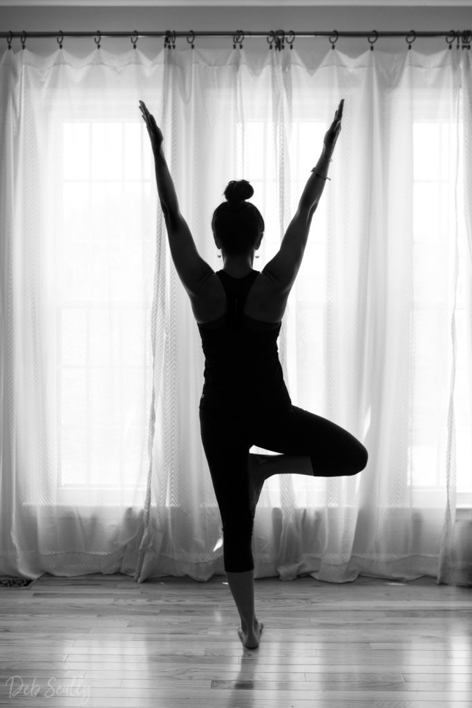 Tree pose pose in Nashville yoga photographer branding session in Nashville TN with Whitney Korman