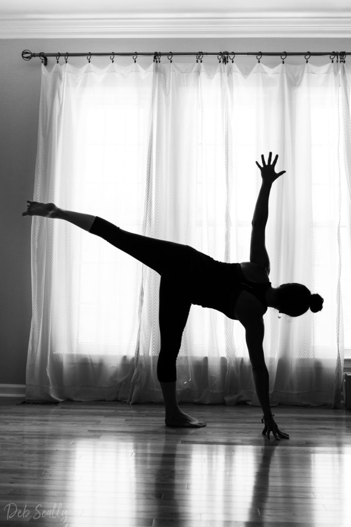 Half Moon pose pose in Nashville yoga photographer branding session in Nashville TN with Whitney Korman