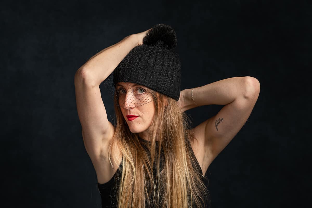 Young woman in black beanie