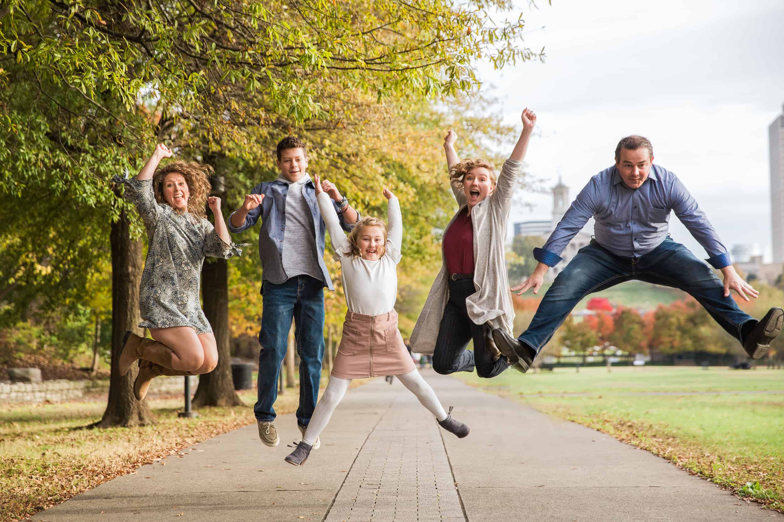 Happy family jumping in Nashville
