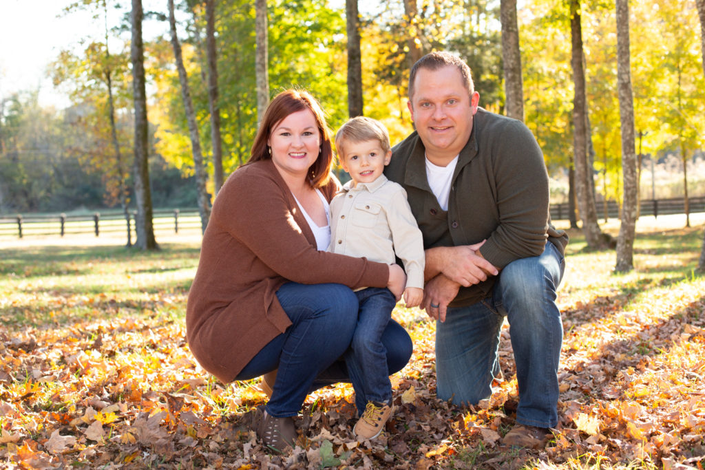 Family photos in fall leaves
