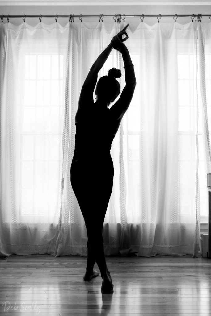 Standing crescent pose in Nashville yoga photographer branding session in Nashville TN with Whitney Korman